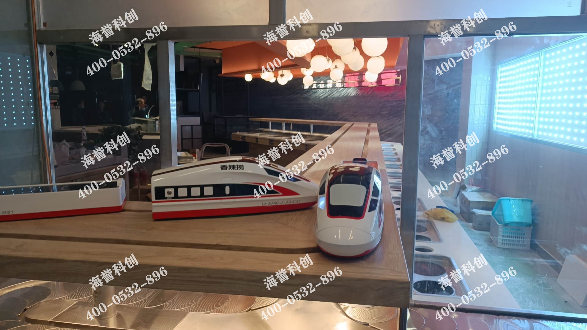 海譽科創(chuàng)遼寧沈陽涮烤一體小火鍋搭載智能送餐小火車安裝完成